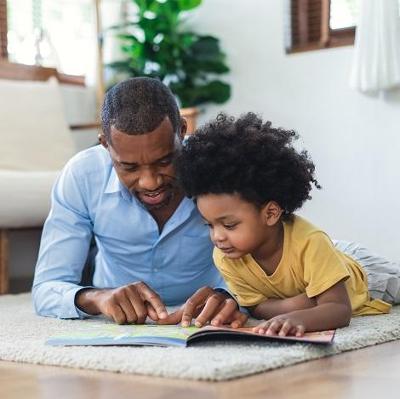 Child Reading With Dad 470 x 470