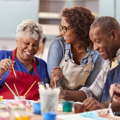 Group of adults painting together