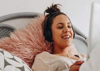Girl relaxing on bed