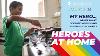 Photo of child cooking food with the text 'MY HERO...HELPS ME BY COOKING AND DOING HOUSEHOLD CHORES HEROES AT HOME'