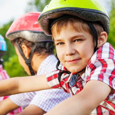 Children with cycling helmets on