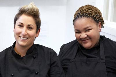 Two people in chef uniforms 