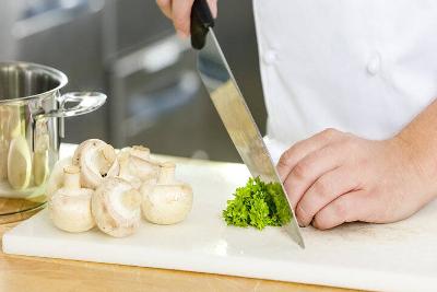 Chef chopping vegetables 
