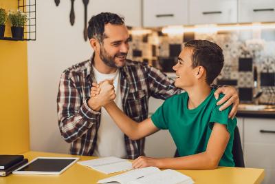 Teen and carer doing homework