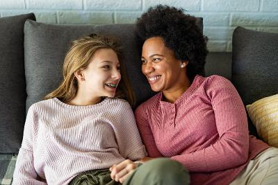 Teen and carer on sofa