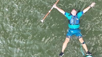 A person using a flotation device in water