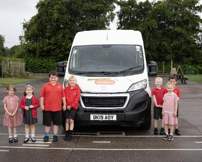 Catfield Primary School students with their minibus