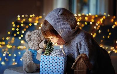 Child opening Christmas present