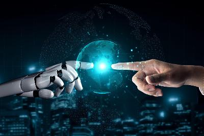 A robotic hand and a human hand touching fingers, with a glow between them