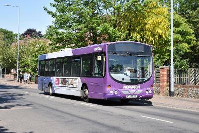 A purple Norwich bus
