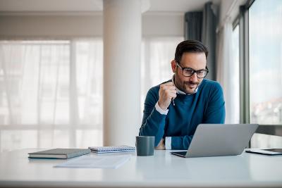 Man sitting at laptop