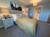 Hunstanton development show apartment bedroom