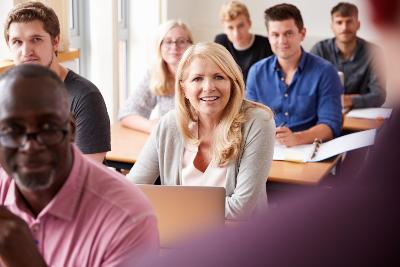 Adults learning in a classroom