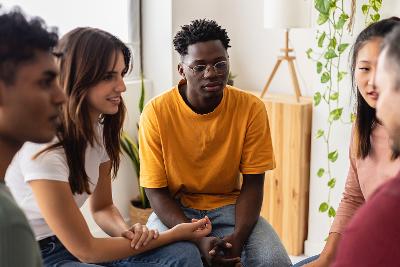 Group of people sat talking