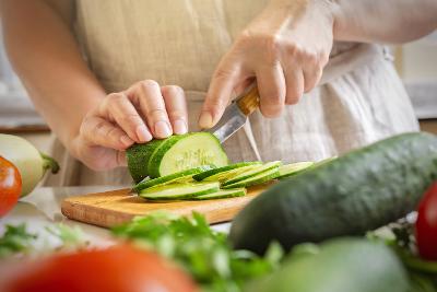 Person chopping vegetables
