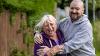Two carers laughing together