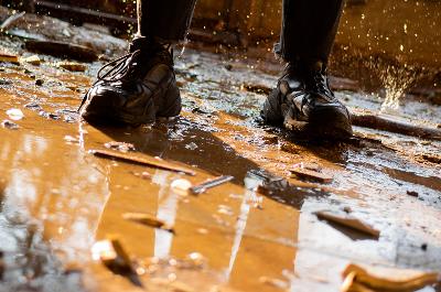 Two feet on flooded ground
